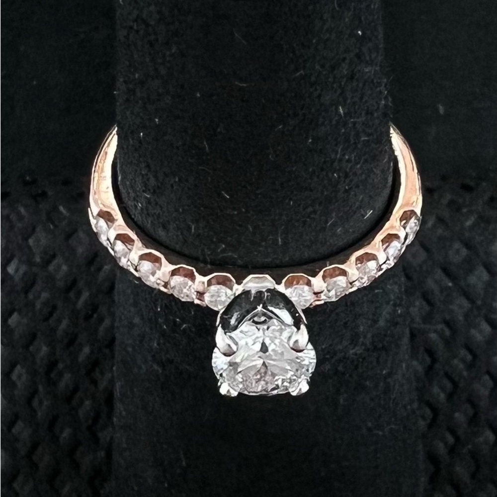 14k rose gold size 5.5 engagement ring with .55CT center diamond